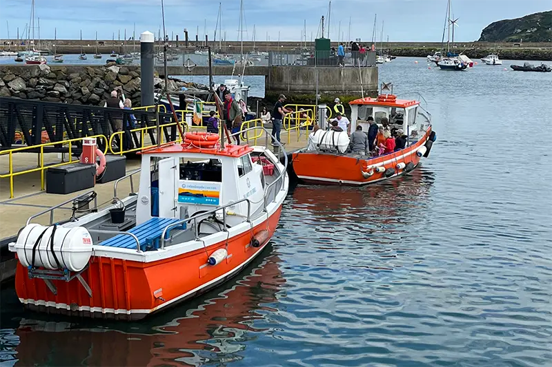 Ireland's Eye Ferries docked at the West Pier in Howth Harbour.