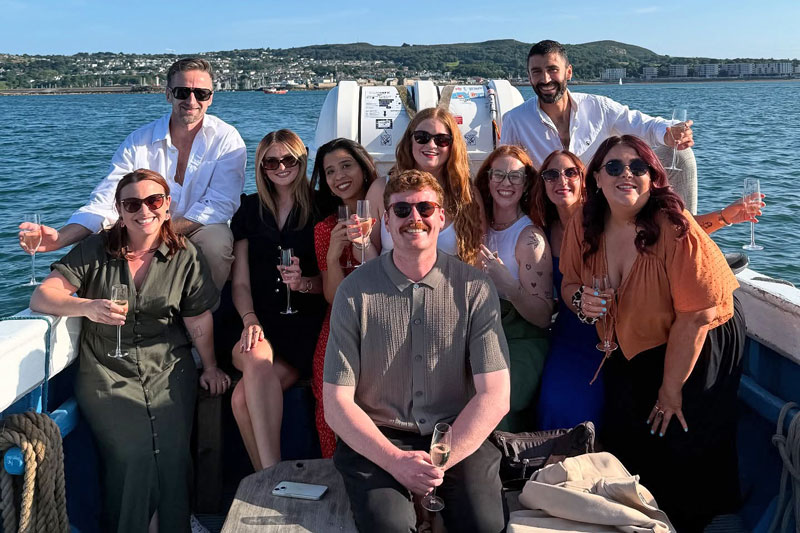 Private cruise group pose on-board Ireland's Eye Ferry before leaving the harbour.