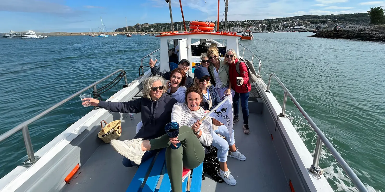 Hen party on board Irelands Eye Ferry, in the harbour.