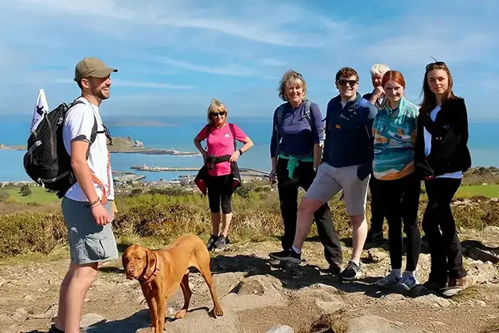 Group of 6 Hikers and a dog on Howth Head, Dublin